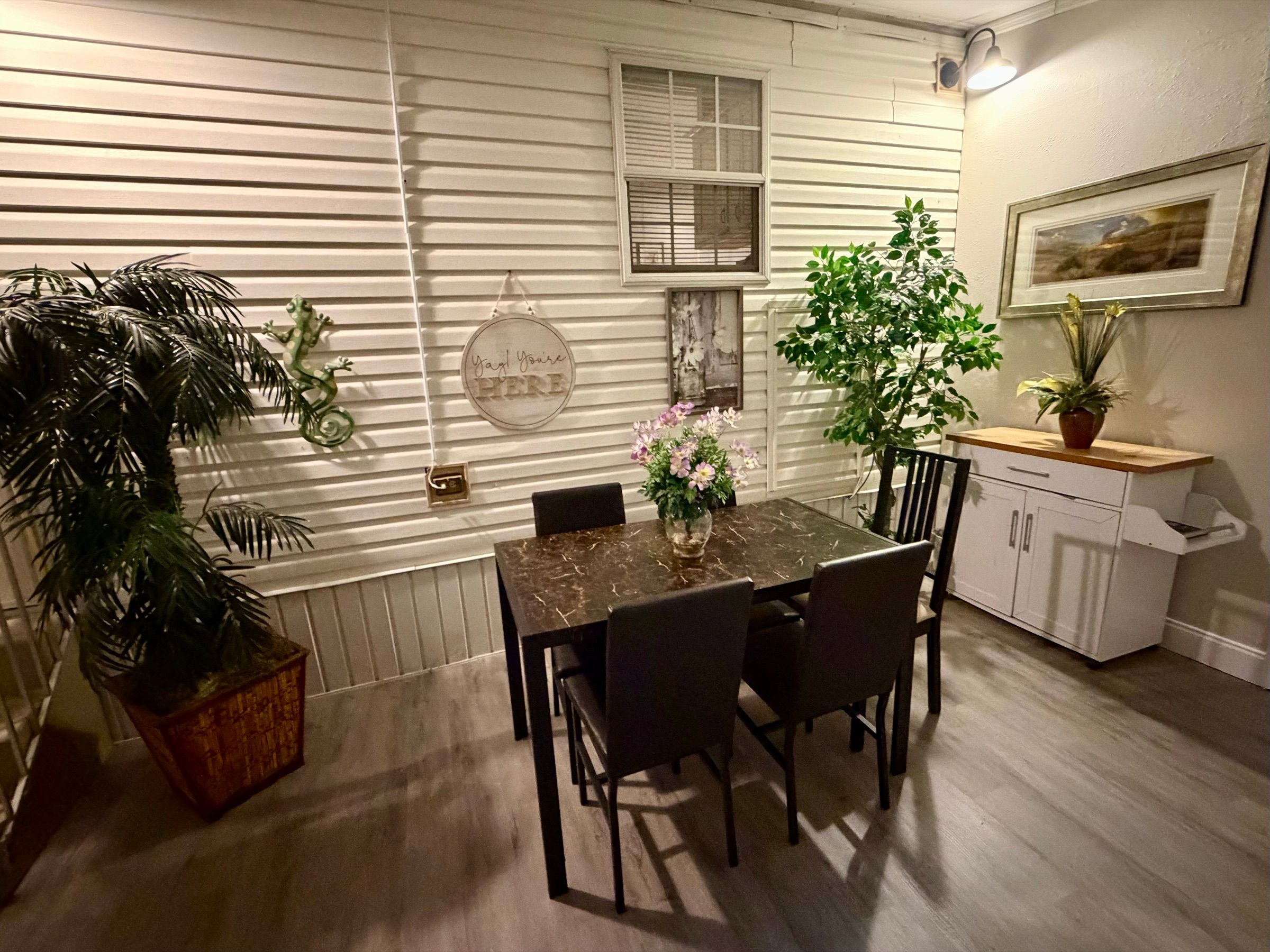 Dining table with chairs at Sunny Sarasota Cottage